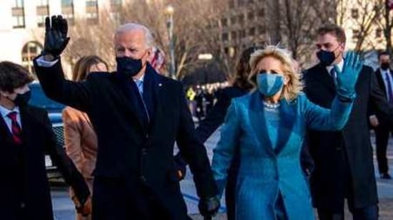 President Joe Biden, First Lady Jill Biden and family, walk near the White House during a Presidential Escort to the White House, Wednesday. (AP Photo )