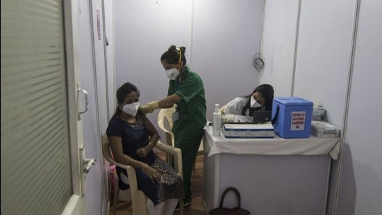 A healthcare worker gets the Covid-19 vaccine shot at the BKC vaccination centre on January 16. (HT FILE)
