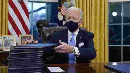 Joe Biden took the presidential oath standing on the steps of the US Capitol, the building complex that had been attacked two weeks earlier by a pro-Trump mob seeking to overturn his victory. Joe Biden took the presidential oath standing on the steps of the US Capitol, the building complex that had been attacked two weeks earlier by a pro-Trump mob seeking to overturn his victory.