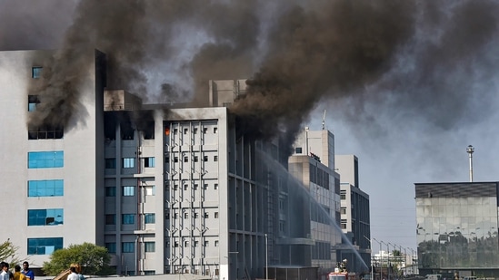 Smoke billows out after a massive fire broke out at the Serum Institute of India, in Pune, Thursday.(PTI)