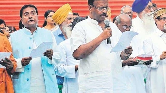 Firhad Hakim with various religious leaders at the TMC rally on Sunday. (Ashok Nath Dey/HT photo) Firhad Hakim with various religious leaders at the TMC rally on Sunday. (Ashok Nath Dey/HT photo)