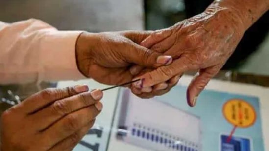 Because of Covid-19 safety protocols, the ECI has decided to reduce the average number of voters in each polling station from 1,500 to nearly 1,000.(PTI/ File photo) Because of Covid-19 safety protocols, the ECI has decided to reduce the average number of voters in each polling station from 1,500 to nearly 1,000.(PTI/ File photo)