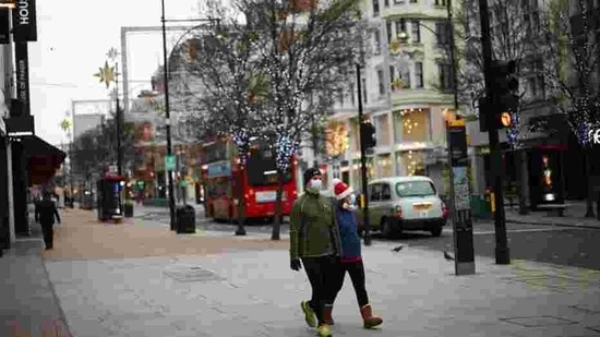 People walk along Oxford Street as shops remain closed under Tier 4 restrictions in London on December 26. There is however, rising confidence help could soon be on the way, with expectation mounting that UK regulators may authorize a second coronavirus vaccine this week. (Henry Nicholls / REUTERS) People walk along Oxford Street as shops remain closed under Tier 4 restrictions in London on December 26. There is however, rising confidence help could soon be on the way, with expectation mounting that UK regulators may authorize a second coronavirus vaccine this week. (Henry Nicholls / REUTERS)