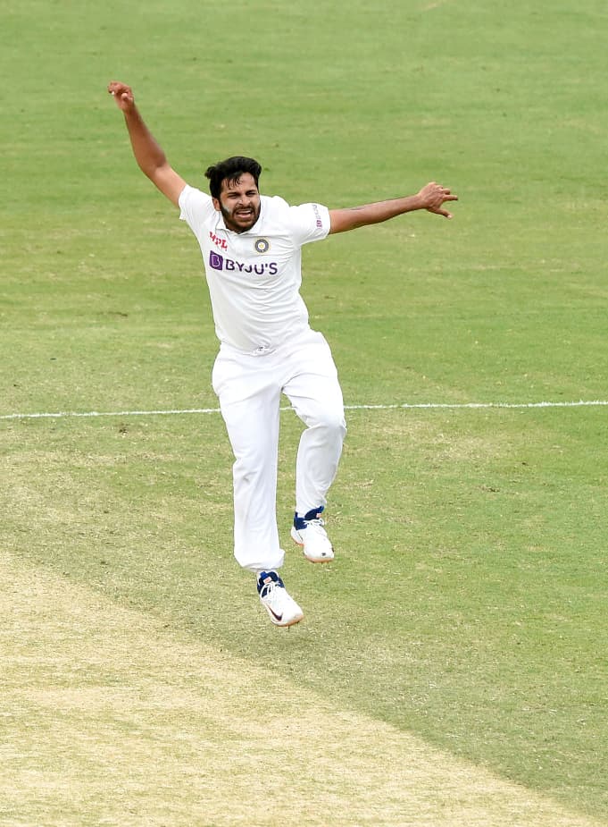 Shardul Thakur of India celebrates the dismissal on the fourth day of the fourth test match between Australia and India, at The Gabba on Monday.