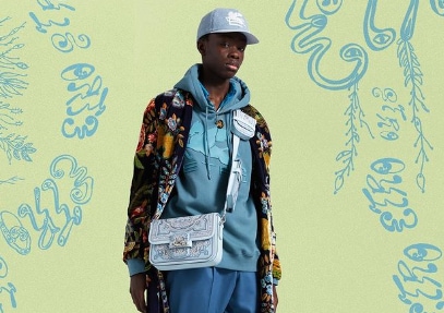 A model layers a hoodie with a statement coat (Photo: Instagram/Etro) A model layers a hoodie with a statement coat (Photo: Instagram/Etro)