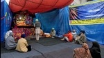 Farmers offering prayer at makeshift a gurdwara at Tikri border during their protest against farm laws, in New Delhi on Thursday. (ANI) Farmers offering prayer at makeshift a gurdwara at Tikri border during their protest against farm laws, in New Delhi on Thursday. (ANI)
