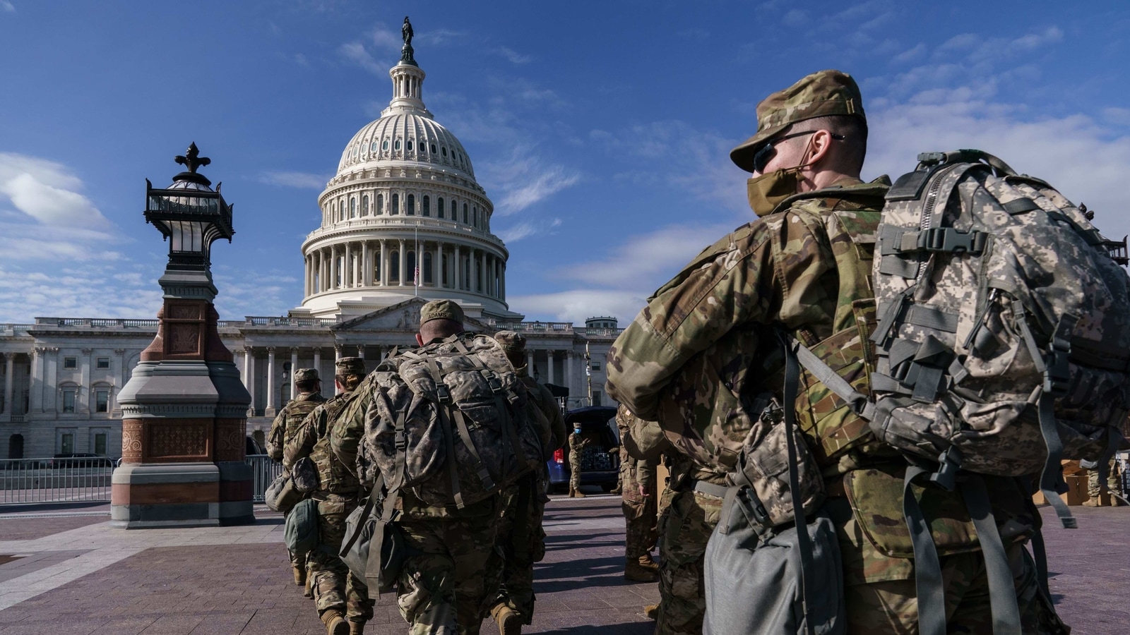 A day after safe inaugural for Joe Biden, over 15,000 Guard troops head ...