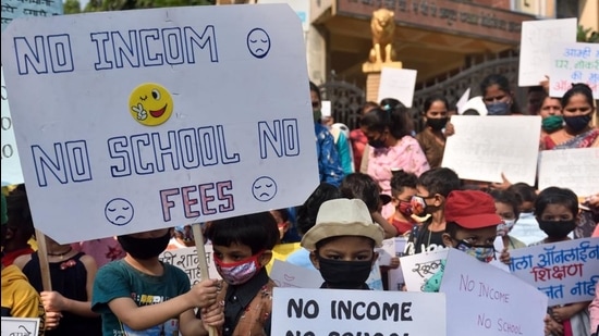 Parents held a silent protest march over the fee hike in November 2020. (Satish Bate/HT PHOTO) Parents held a silent protest march over the fee hike in November 2020. (Satish Bate/HT PHOTO)