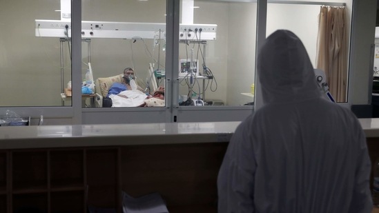 The explosion of Covid-19 has not only overwhelmed staff and facilities but pushed more hospitals into financial distress(AP) The explosion of Covid-19 has not only overwhelmed staff and facilities but pushed more hospitals into financial distress(AP)