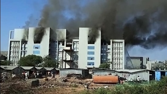 Smoke billowing out of the SII facility which caught fire, in Pune on Thursday. (ANI)