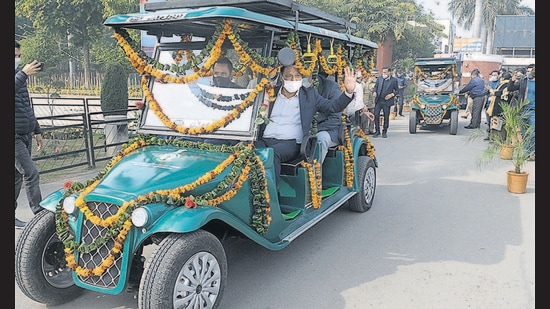 Chandigarh adviser Manoj Parida taking a ride in a solar car at Sukhna Lake on Friday. (Ravi Kumar/HT) Chandigarh adviser Manoj Parida taking a ride in a solar car at Sukhna Lake on Friday. (Ravi Kumar/HT)