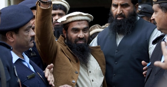 Police officers escort Zaki-ur-Rehman Lakhvi, center, the main suspect of the Mumbai terror attacks in 2008, after his court appearance in Islamabad, Pakistan.(AP Photo) Police officers escort Zaki-ur-Rehman Lakhvi, center, the main suspect of the Mumbai terror attacks in 2008, after his court appearance in Islamabad, Pakistan.(AP Photo)
