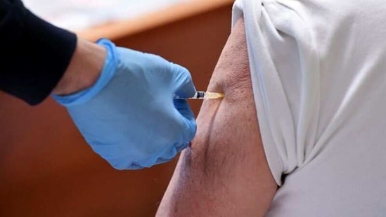 A volunteer who assists medical workers receives a dose of the Moderna coronavirus disease (COVID-19) vaccine at the Misericordia hospital in Grosseto, Italy, January 18, 2021. REUTERS/Jennifer Lorenzini/Files (REUTERS)