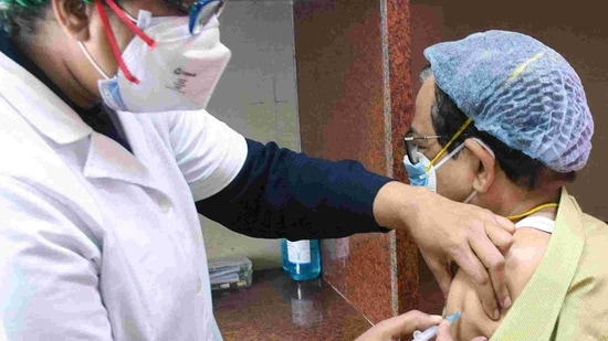 A medic administers the Covid-19 vaccine to the frontline worker during a vaccination drive in Kolkata.(ANI)
