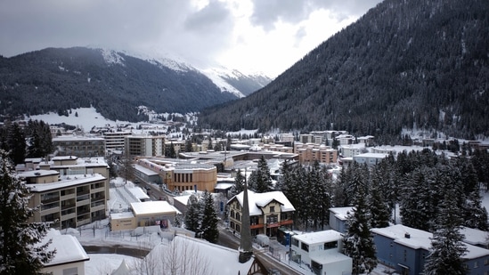This year, there are no helicopters patrolling the skies, no protesters trying to outwit security forces sealing off the Alpine resort(AP) This year, there are no helicopters patrolling the skies, no protesters trying to outwit security forces sealing off the Alpine resort(AP)