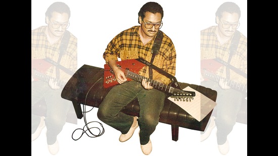 Leslee Lewis with his first electric guitar, he brought from Singapore, which was shaped like a gun Leslee Lewis with his first electric guitar, he brought from Singapore, which was shaped like a gun