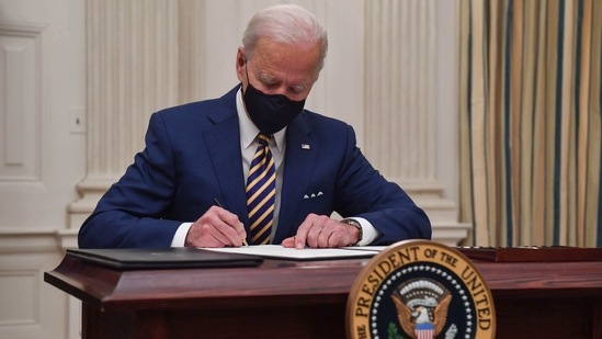 Called the US Citizenship Act of 2021, the legislation modernises the immigration system, and also proposes to eliminate the per country cap for employment-based green cards, a move that would benefit thousands of Indian IT professionals.(AFP) Called the US Citizenship Act of 2021, the legislation modernises the immigration system, and also proposes to eliminate the per country cap for employment-based green cards, a move that would benefit thousands of Indian IT professionals.(AFP)