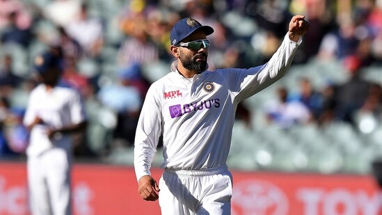 India's captain Virat Kohli directs his fielders on the third day of their cricket test match against Australia at the Adelaide Oval in Adelaide, (AP)