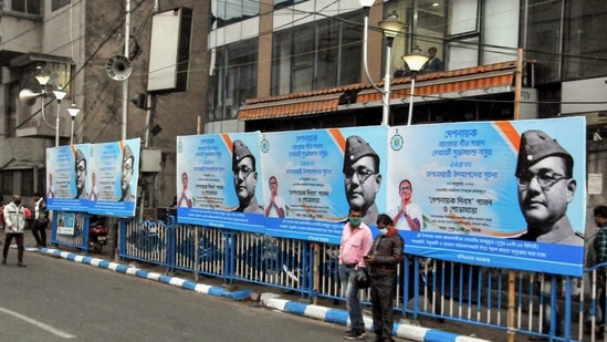 Huge signboards with pictures of Netaji Subhash Chandra Bose put up at a railing along a road, on the eve of his 125th birth anniversary, in Kolkata.(PTI)