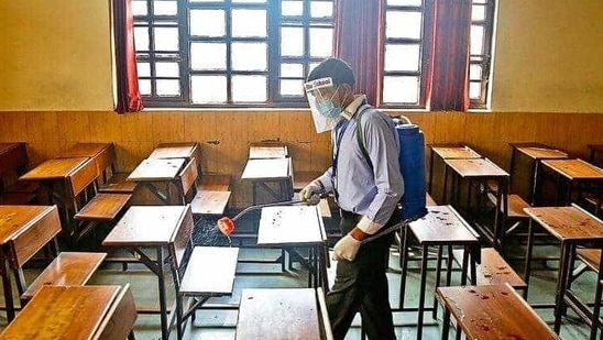 A classroom being sanitised( anchit Khanna/HT PHOTO) A classroom being sanitised( anchit Khanna/HT PHOTO)