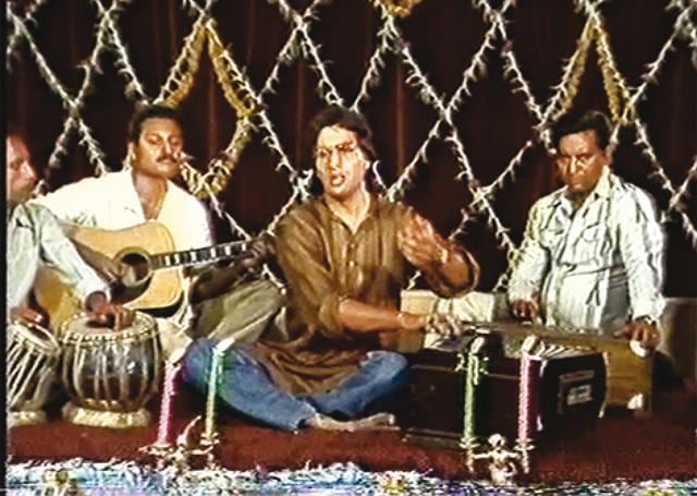Leslee backing singer Talat Aziz during a performance Leslee backing singer Talat Aziz during a performance