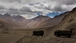 In this file photo, Indian army trucks drive near Pangong Tso lake near the India China border in Ladakh area. (AP) In this file photo, Indian army trucks drive near Pangong Tso lake near the India China border in Ladakh area. (AP)