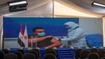 Dr. Abdel Menoim Selim, is shown on a live screen receiving the Sinopharm Covid-19 vaccine, ahead of a press conference, at the Abu Khalifa Hospital in Ismailia, 120 kilometers (75 miles) east of Cairo, Egypt,(AP) Dr. Abdel Menoim Selim, is shown on a live screen receiving the Sinopharm Covid-19 vaccine, ahead of a press conference, at the Abu Khalifa Hospital in Ismailia, 120 kilometers (75 miles) east of Cairo, Egypt,(AP)
