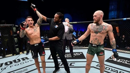 Dustin Poirier reacts after his knockout victory over Conor McGregor of Ireland in a lightweight fight during the UFC 257 event inside Etihad Arena on UFC Fight Island. (USA TODAY Sports)