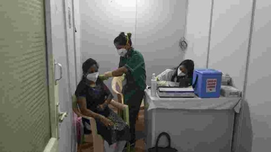 A healthcare worker gets the Covid-19 vaccine shot at the BKC vaccination centre on January 16. (HT FILE) A healthcare worker gets the Covid-19 vaccine shot at the BKC vaccination centre on January 16. (HT FILE)