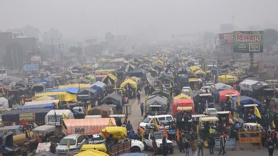 Tractor trolleys of farmers parked at Kundli border during their ongoing agitation against the new farm laws, on Sunday.(PTI Photo)