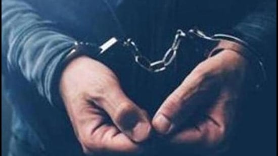 Arrested computer hacker and cyber criminal with handcuffs, close up of hands (Getty Images/iStockphoto) Arrested computer hacker and cyber criminal with handcuffs, close up of hands (Getty Images/iStockphoto)