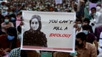 FILE - In this Dec. 24, 2020, file photo, supporters of Baloch political activist Karima Baloch hold here portrait during a demonstration to condemn her killing, in Karachi, Pakistan. Baloch, who died in exile in Canada last month, was brought home and laid to rest in her home village in the southwestern Baluchistan province under tight security, activists said Monday, Jan. 25, 2021. (AP Photo/Fareed Khan, File)(AP) FILE - In this Dec. 24, 2020, file photo, supporters of Baloch political activist Karima Baloch hold here portrait during a demonstration to condemn her killing, in Karachi, Pakistan. Baloch, who died in exile in Canada last month, was brought home and laid to rest in her home village in the southwestern Baluchistan province under tight security, activists said Monday, Jan. 25, 2021. (AP Photo/Fareed Khan, File)(AP)