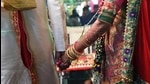 If a couple marrying under SMA did not want their details to be made public, they could not be compelled to do so. (AFP) If a couple marrying under SMA did not want their details to be made public, they could not be compelled to do so. (AFP)
