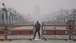 A security personal stands guard at Rajpath ahead of India's Republic Day celebrations in New Delhi.(AFP) A security personal stands guard at Rajpath ahead of India's Republic Day celebrations in New Delhi.(AFP)
