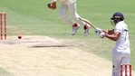 India's Shubman Gill, right, hits a delivery from Australia's Mitchell Starc.(AP) India's Shubman Gill, right, hits a delivery from Australia's Mitchell Starc.(AP)