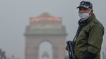 A security personnel keeps vigil at Rajpath on the eve of the Republic Day parade, in New Delhi.(PTI) A security personnel keeps vigil at Rajpath on the eve of the Republic Day parade, in New Delhi.(PTI)