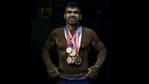 Deaf Olympic Gold medalist wrestler Virender Singh poses for a portrait with his medals at his akhara near Sadar Bazar in New Delhi.(Ravi Choudhary/HT PHOTO) Deaf Olympic Gold medalist wrestler Virender Singh poses for a portrait with his medals at his akhara near Sadar Bazar in New Delhi.(Ravi Choudhary/HT PHOTO)