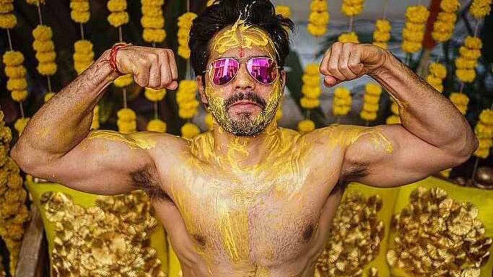 Photo of Two sisters pose together on the haldi ceremony