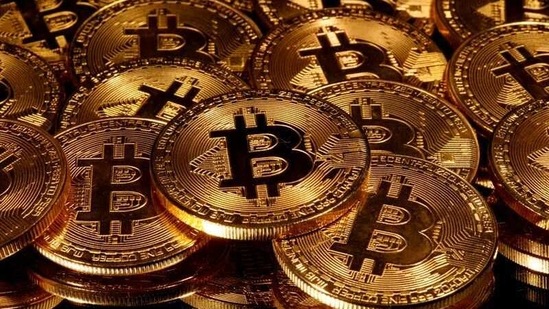 FILE PHOTO: Representations of virtual currency bitcoin are seen in this picture illustration taken taken March 13, 2020. REUTERS/Dado Ruvic/Illustration/File Photo(REUTERS)