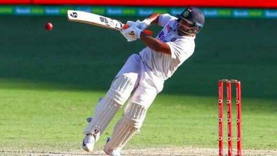 India's Rishabh Pant falls as he hits the ball for four runs during play on the final day of the fourth cricket test between India and Australia at the Gabba.(AP) India's Rishabh Pant falls as he hits the ball for four runs during play on the final day of the fourth cricket test between India and Australia at the Gabba.(AP)