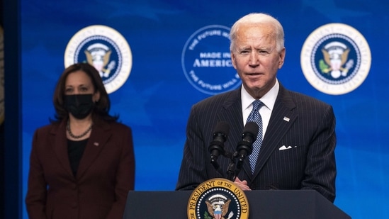 U.S. President Joe Biden delivers remarks on strengthening American manufacturing with U.S. Vice President Kamala Harris, left, at the Eisenhower Executive Office Building in Washington, D.C., U.S., on Monday, Jan. 25, 2021. President Biden will sign an executive order today to boost federal agencies' purchases of U.S. products, fulfilling a campaign pledge to lay out a "Buy American" plan. Photographer: Kevin Dietsch/UPI/Bloomberg(Bloomberg) U.S. President Joe Biden delivers remarks on strengthening American manufacturing with U.S. Vice President Kamala Harris, left, at the Eisenhower Executive Office Building in Washington, D.C., U.S., on Monday, Jan. 25, 2021. President Biden will sign an executive order today to boost federal agencies' purchases of U.S. products, fulfilling a campaign pledge to lay out a "Buy American" plan. Photographer: Kevin Dietsch/UPI/Bloomberg(Bloomberg)