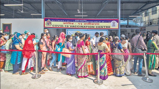 People stand in queue to get Covid-19 vaccination at Rajawadi Hospital in Mumbai on Monday. (Pratik Chorge/HT Photo) People stand in queue to get Covid-19 vaccination at Rajawadi Hospital in Mumbai on Monday. (Pratik Chorge/HT Photo)