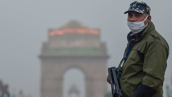 A security personnel keeps vigil at Rajpath on the eve of the Republic Day parade, in New Delhi.(PTI) A security personnel keeps vigil at Rajpath on the eve of the Republic Day parade, in New Delhi.(PTI)