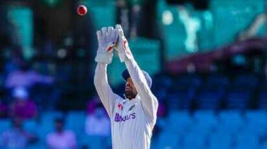 India's substitute wicketkeeper Wriddhiman Saha reaches for the ball during play on day three of the third cricket test between India and Australia at the Sydney Cricket Ground, Sydney, Australia.(AP)