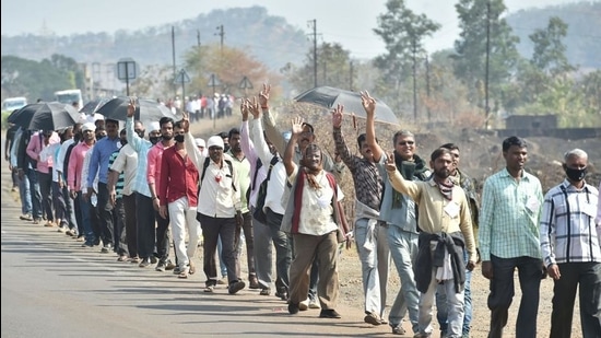 Farmers from Nashik district walk along the Nashik-Mumbai highway to participate in the protest march scheduled to take place on January 25, in Mumbai. (PTI) Farmers from Nashik district walk along the Nashik-Mumbai highway to participate in the protest march scheduled to take place on January 25, in Mumbai. (PTI)
