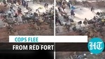 Police personnel fled from protestors at Red Fort (ANI) Police personnel fled from protestors at Red Fort (ANI)