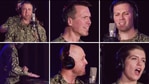 The image shows members of the US Navy Band wearing headphones as they take turns singing lyrics of Taylor Swift's song into the microphones.(Twitter/@usnavyband) The image shows members of the US Navy Band wearing headphones as they take turns singing lyrics of Taylor Swift's song into the microphones.(Twitter/@usnavyband)