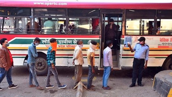 Passengers undergo thermal screening before boarding a bus at Anand Vihar Bus Terminal in New Delhi. (Raj K Raj/ Hindustan Times) Passengers undergo thermal screening before boarding a bus at Anand Vihar Bus Terminal in New Delhi. (Raj K Raj/ Hindustan Times)