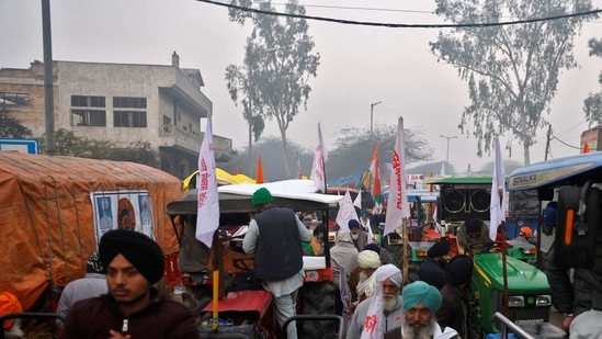 Farmers gather to take part in a tractor rally to protest against farm laws on the occasion of Republic Day at Singhu border near Delhi. (Reuters Photo )