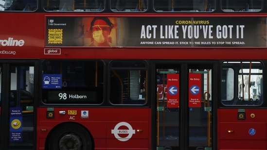 A lone bus passenger sits on the top deck, wearing a mask to prevent the spread of COVID-19, in Oxford Street London(AP) A lone bus passenger sits on the top deck, wearing a mask to prevent the spread of COVID-19, in Oxford Street London(AP)